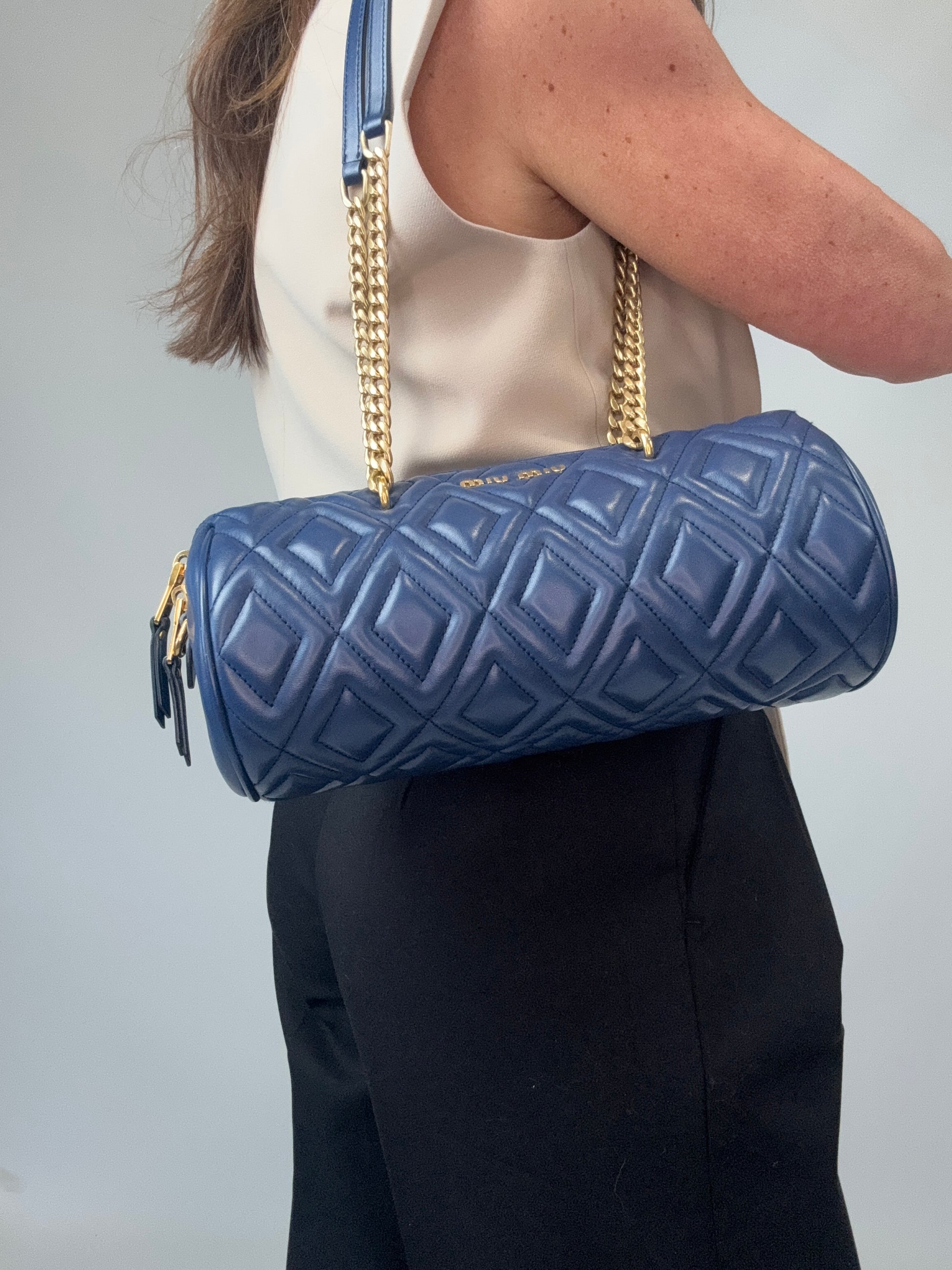 Miu Miu Diamond Quilted Cylinder Bag in Blue modeled