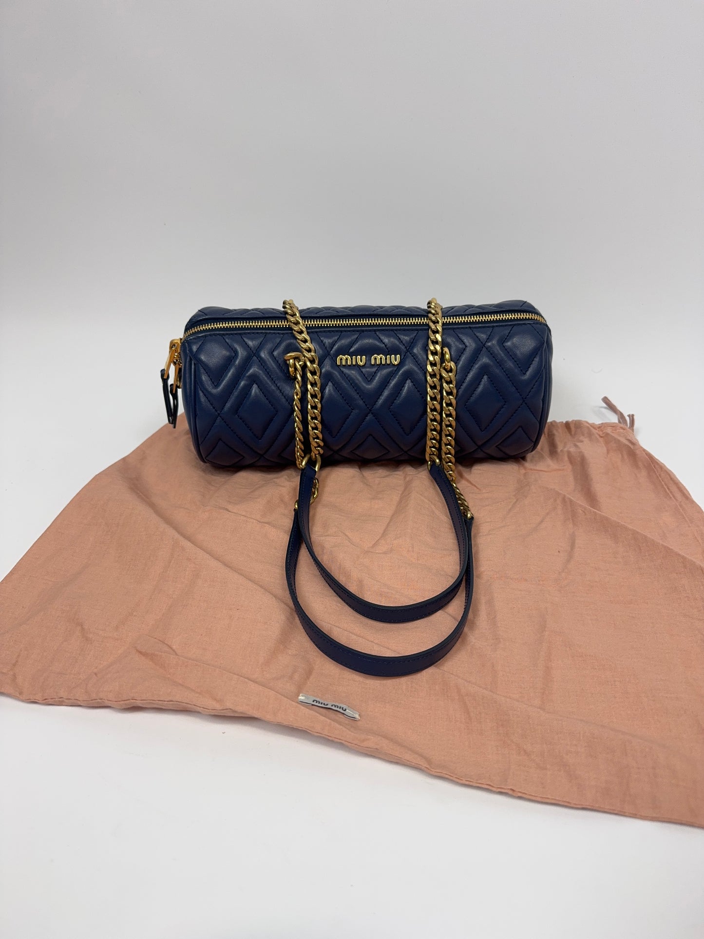 Miu Miu Diamond Quilted Cylinder Bag in Blue with dust bag