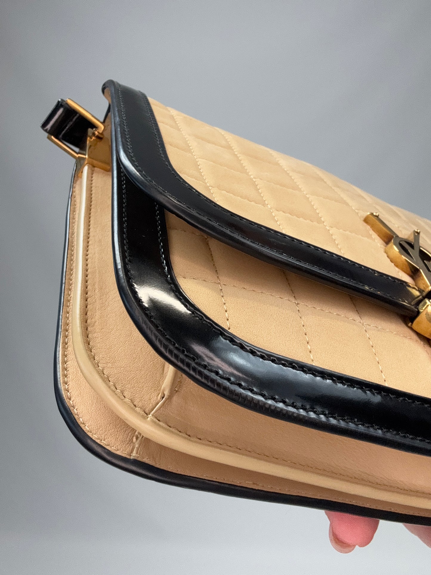 Saint Laurent Quilted Suede Monogram Solferino Bag front left bottom corner