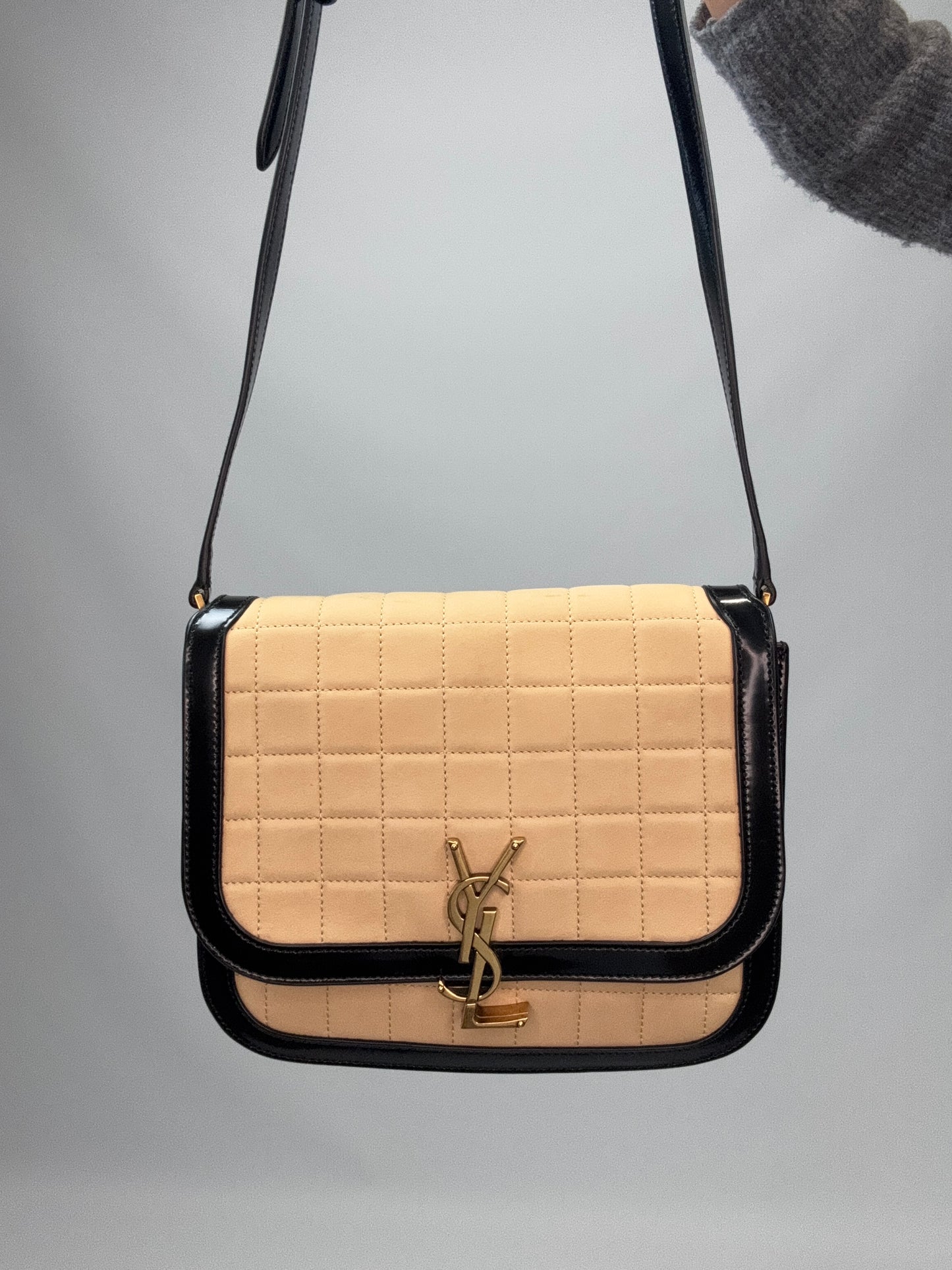 Saint Laurent Quilted Suede Monogram Solferino Bag front of handbag