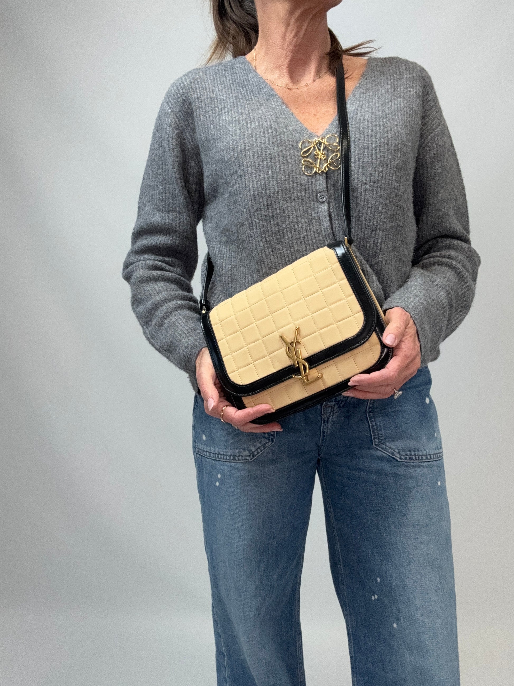 Saint Laurent Quilted Suede Monogram Solferino Bag modeled 2