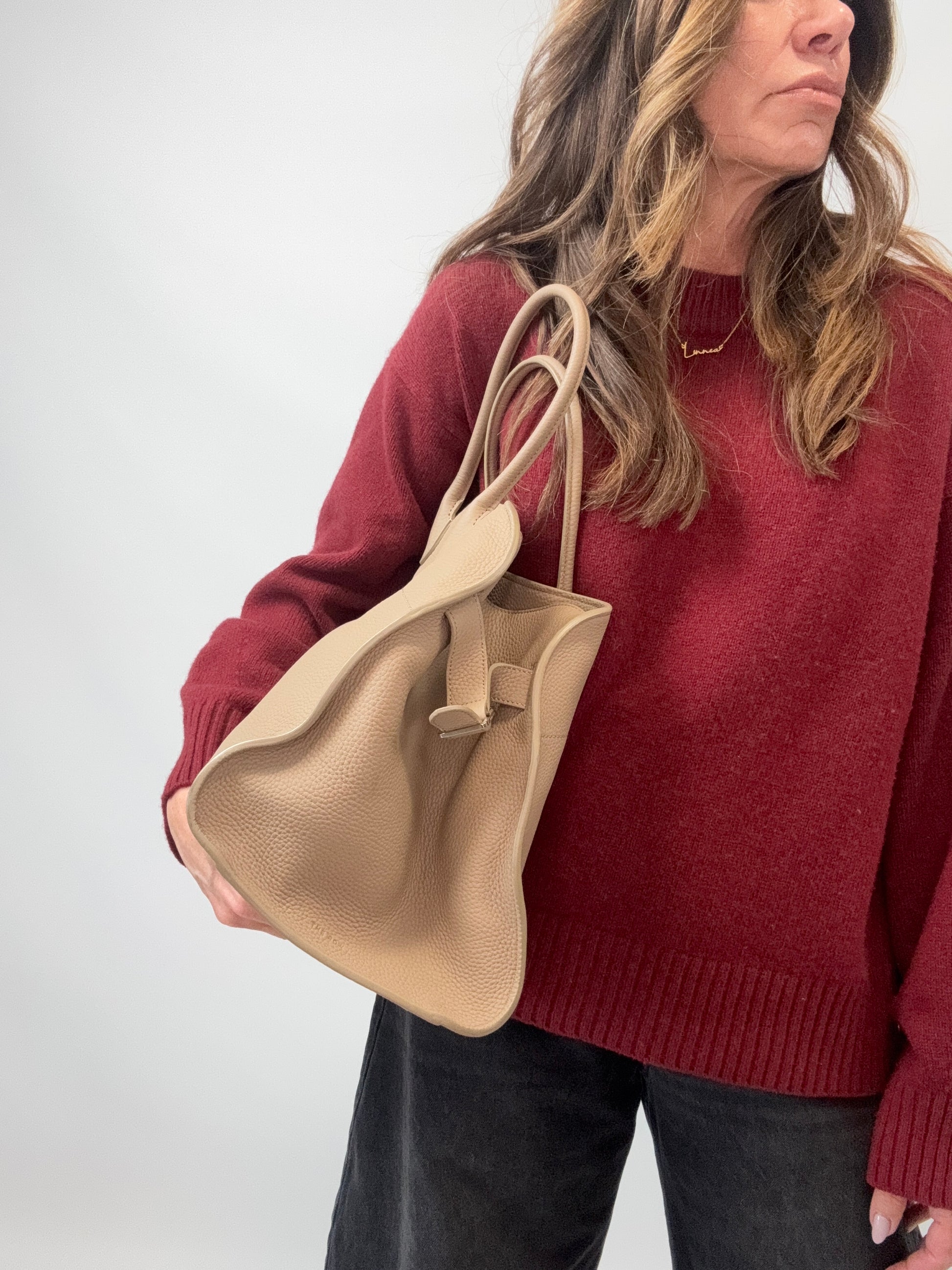 The Row Soft Margaux 15 Bag Beige modeled 2