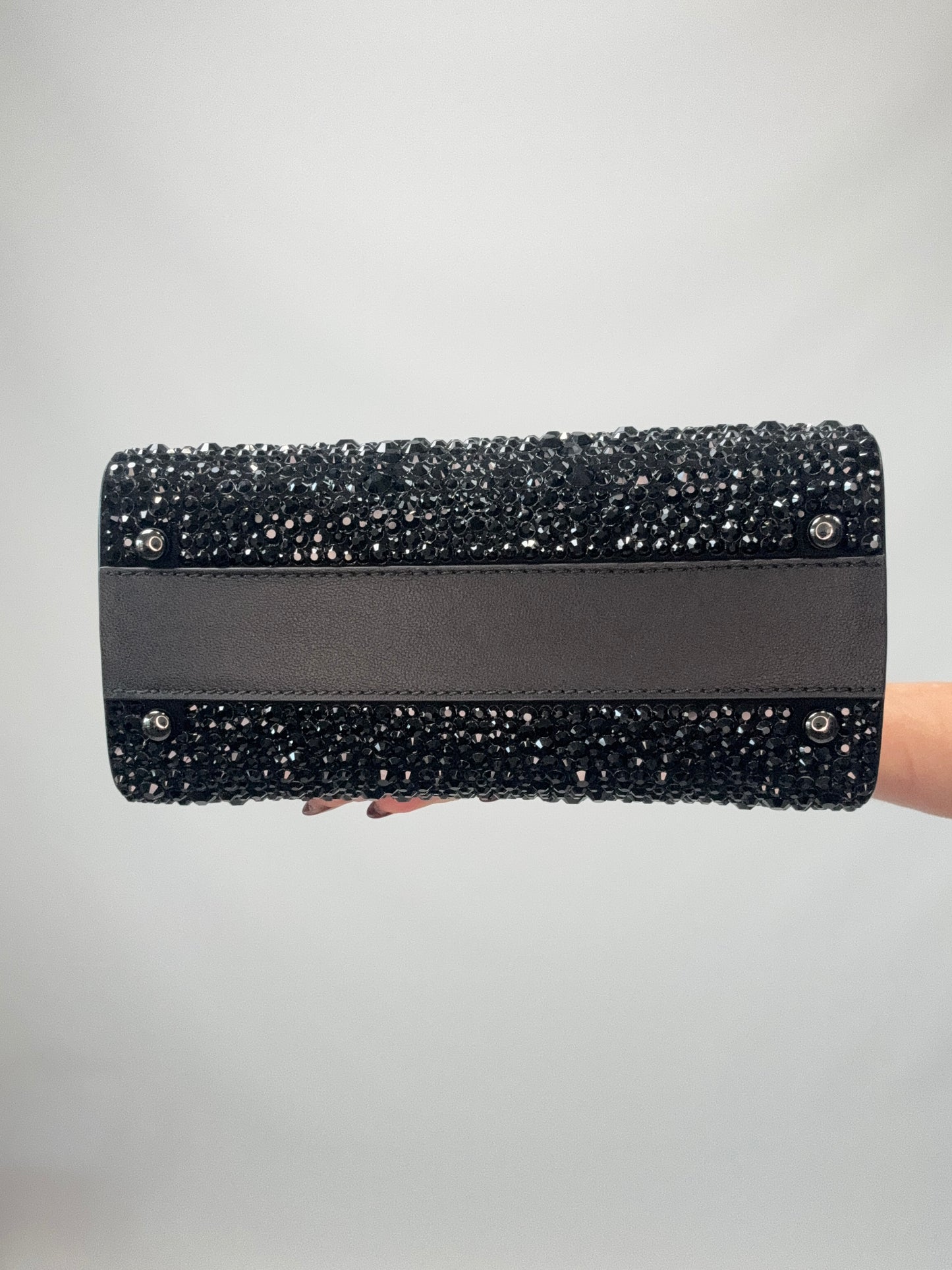 Valentino Garavani Mini VSling - Black bottom of handbag