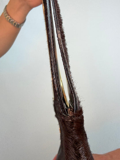 Gucci by Tom Ford oversized shoulder bag in brown pony hair from the Fall/Winter 1996 runway collection. Left Side of Bag